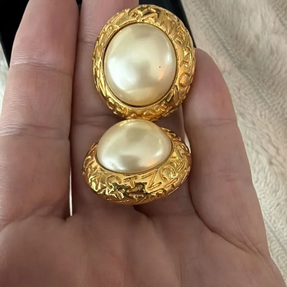 ⁠Vintage CHANEL Paris Gold Tone Faux Pearl Round Clip On stud Earrings Signed